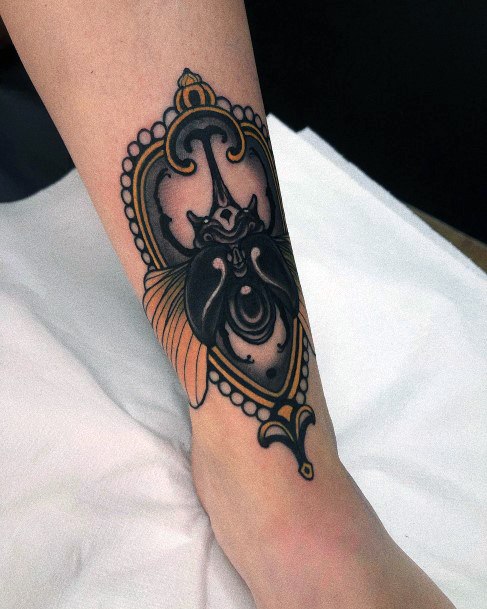 Artistic Brooch Tattoo On Woman