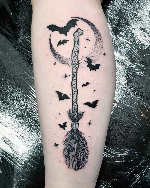 Artistic Broomstick Tattoo On Woman With Moon And Bat Design