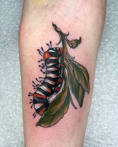 Artistic Caterpillar Tattoo On Woman