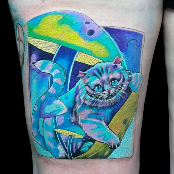 Artistic Cheshire Cat Tattoo On Woman