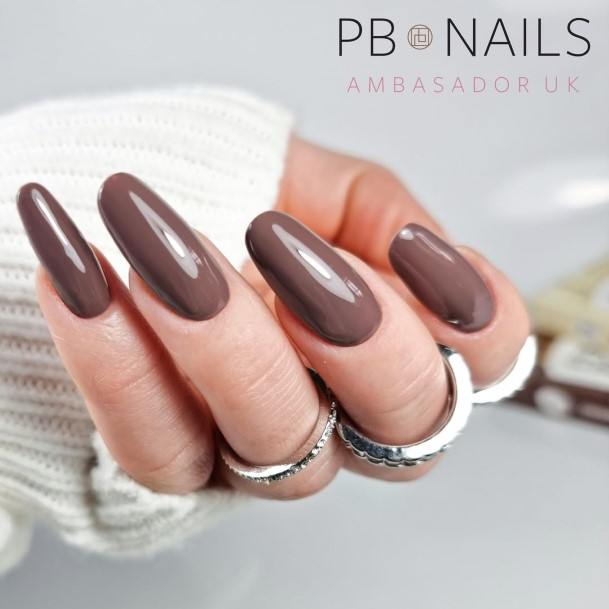 Artistic Chocolate Nail On Woman