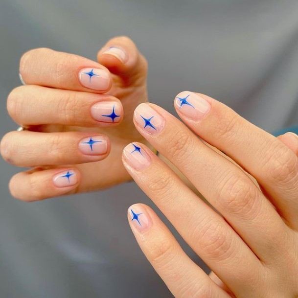 Artistic Clear Blue Nail On Woman