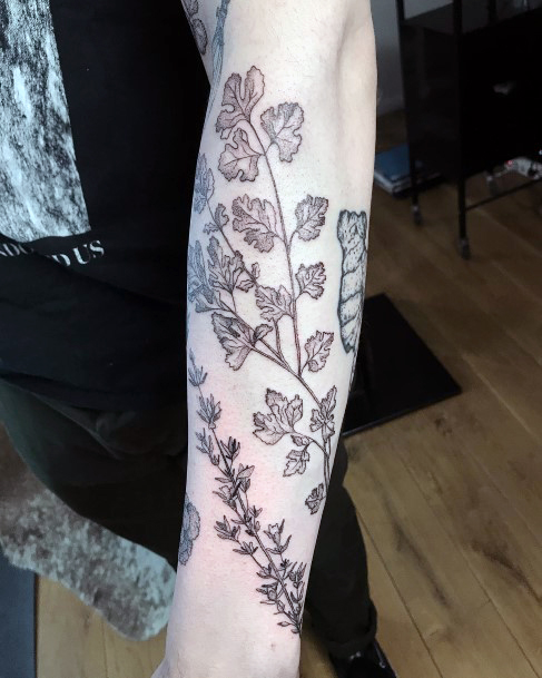 Artistic Coriander Tattoo On Woman