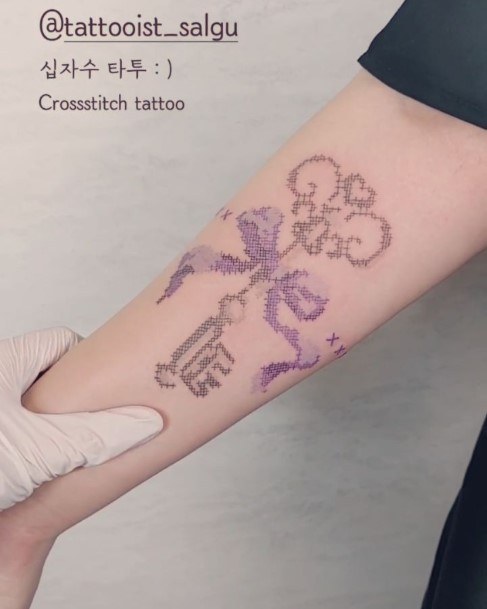 Artistic Cross Stitch Tattoo On Woman