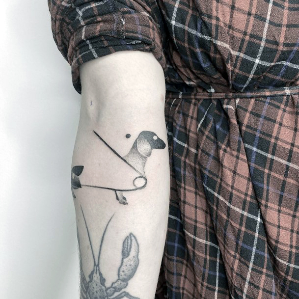 Artistic Dachshund Tattoo On Woman