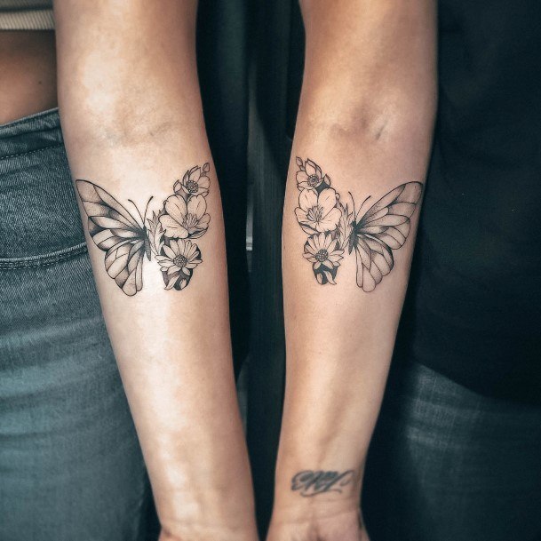 Artistic Daisy Tattoo On Woman Matching Sisters