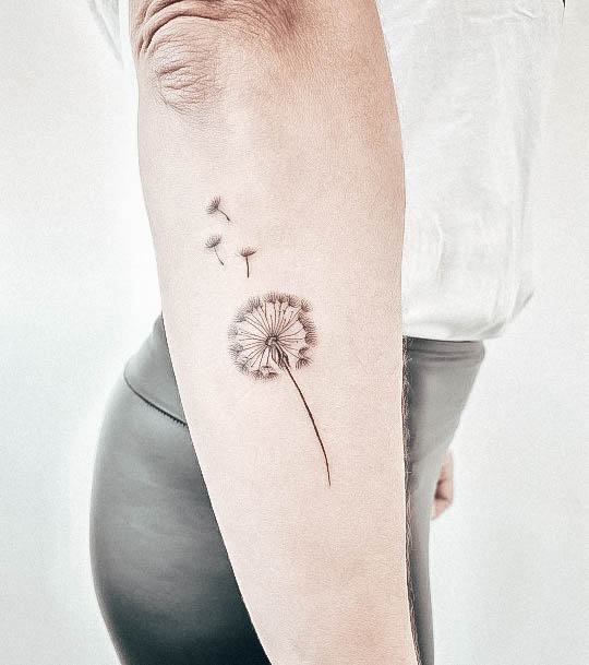 Artistic Dandelion Tattoo On Woman