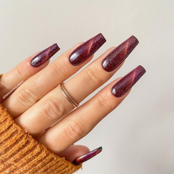 Artistic Dark Maroon Nail On Woman