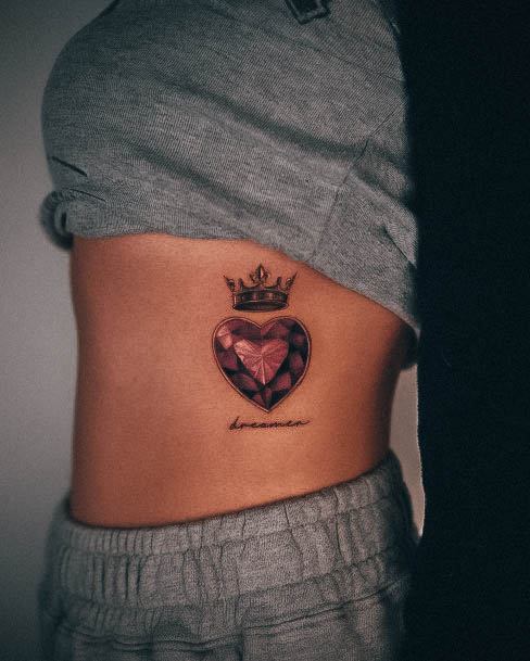 Artistic Diamond Tattoo On Woman Rib Cage Side With Crown