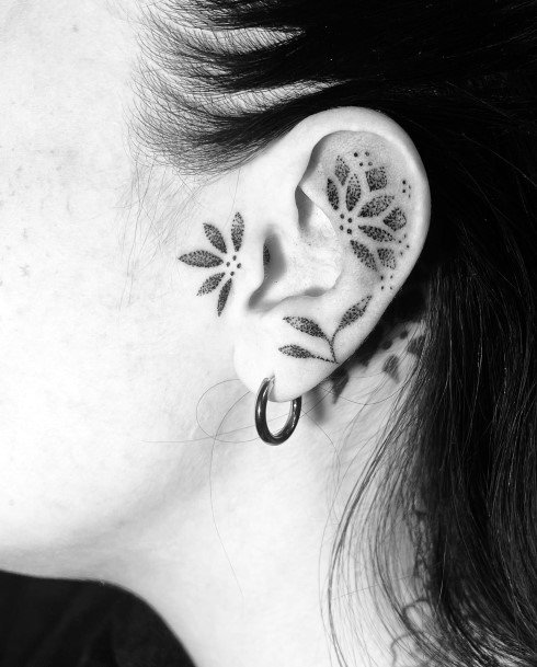 Artistic Ear Tattoo On Woman Geometric