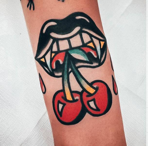 Artistic Fangs Tattoo On Woman