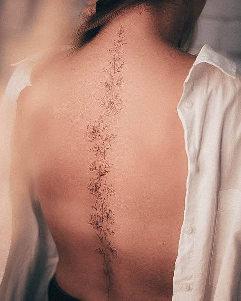 Artistic Fine Line Tattoo On Woman