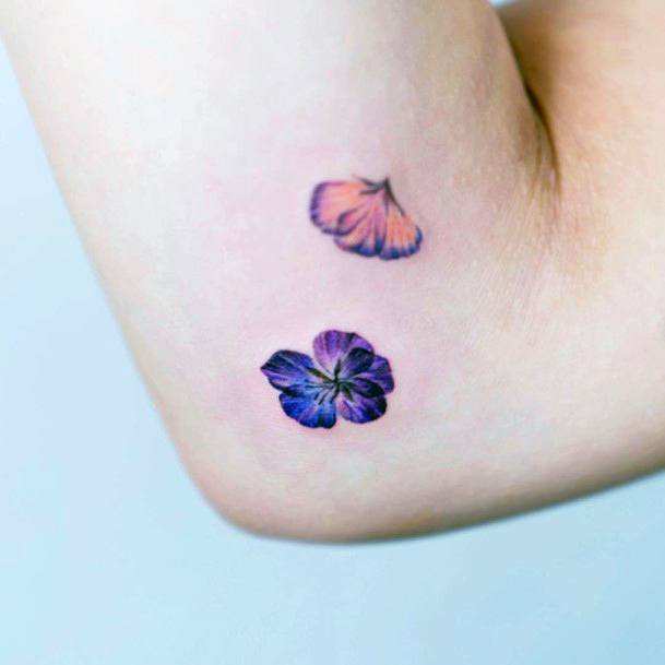 Artistic Flower Petal Tattoo On Woman