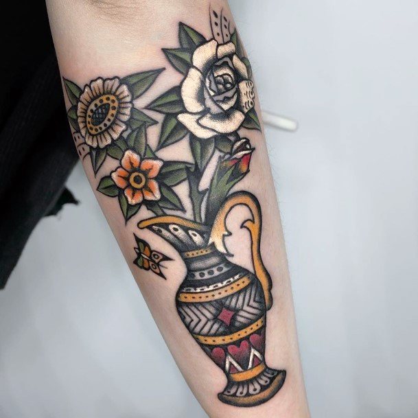 Artistic Flower Vase Tattoo On Woman