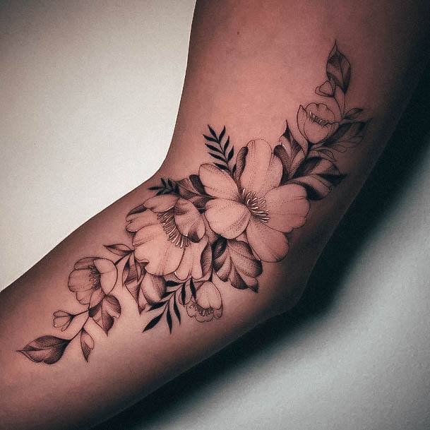 Artistic Girly Tattoo On Woman Inner Arm Flowers