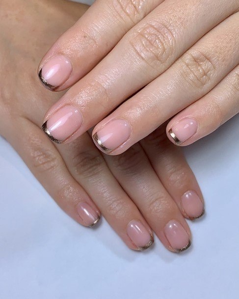 Artistic Gold French Tip Nail On Woman