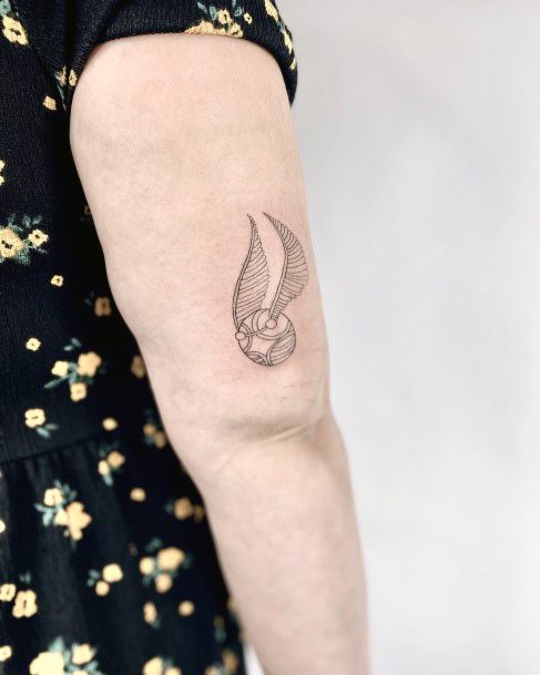 Artistic Golden Snitch Tattoo On Woman