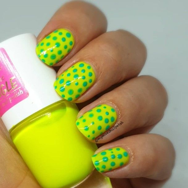Artistic Green And Yellow Nail On Woman