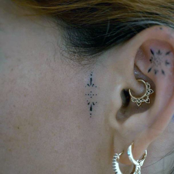 Artistic Handpoke Tattoo On Woman Ears