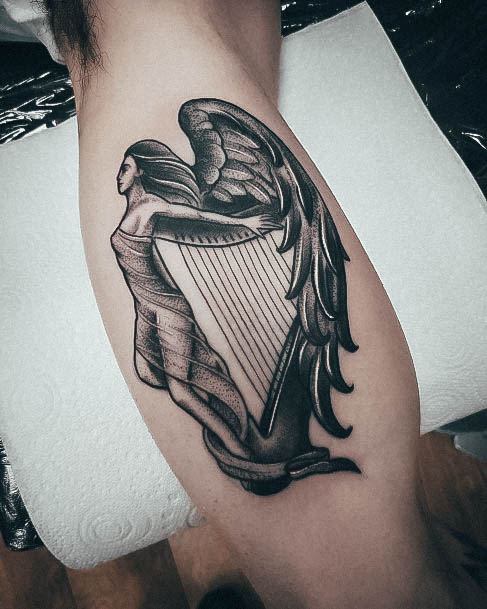 Artistic Harp Tattoo On Woman