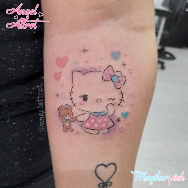 Artistic Hello Kitty Tattoo On Woman