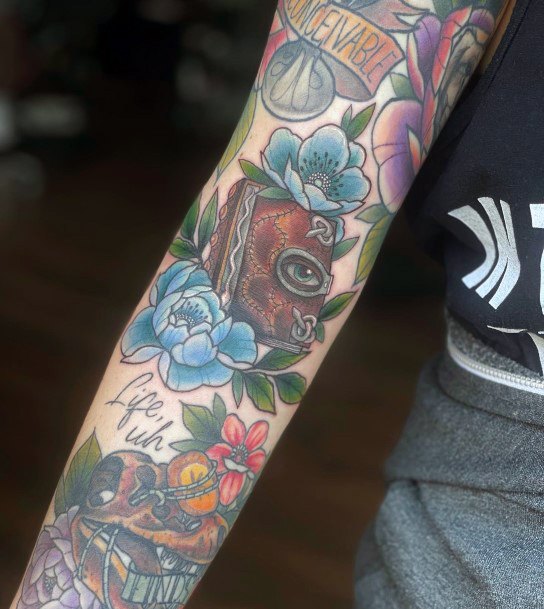 Artistic Hocus Pocus Tattoo On Woman