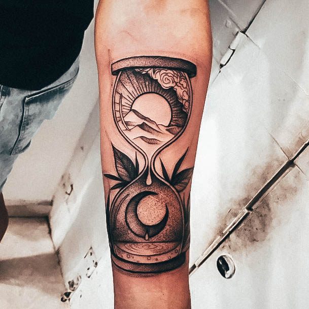 Artistic Hourglass Tattoo On Woman Forearm
