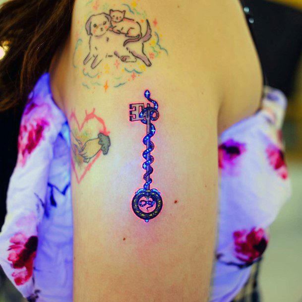 Artistic Key Tattoo On Woman