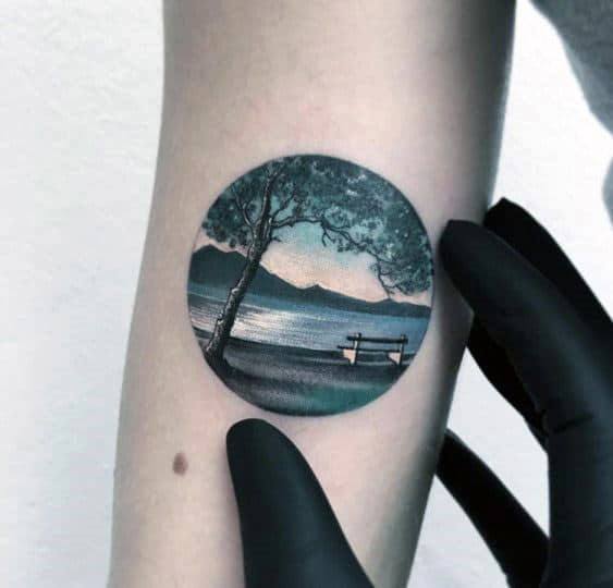 Artistic Lake Tattoo On Woman