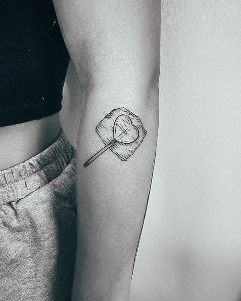 Artistic Lollipop Tattoo On Woman