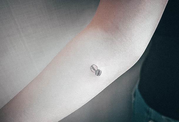 Artistic Macaron Tattoo On Woman