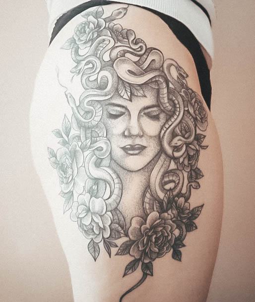 Artistic Medusa Tattoo On Woman Thigh