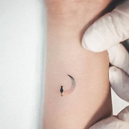 Artistic Minimalist Tattoo On Woman