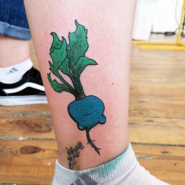 Artistic Oddish Tattoo On Woman