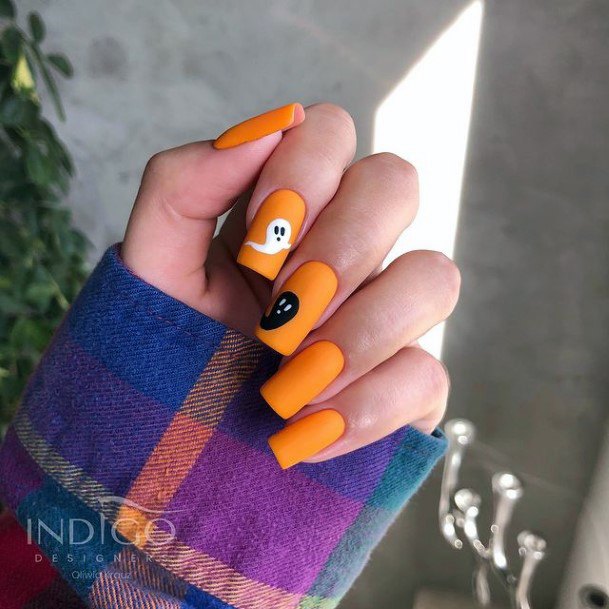 Artistic Orange Nail On Woman