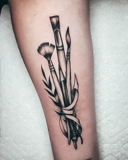 Artistic Paint Brush Tattoo On Woman