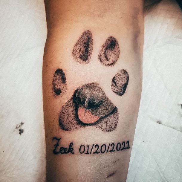 Artistic Paw Print Tattoo On Woman Leg Calf