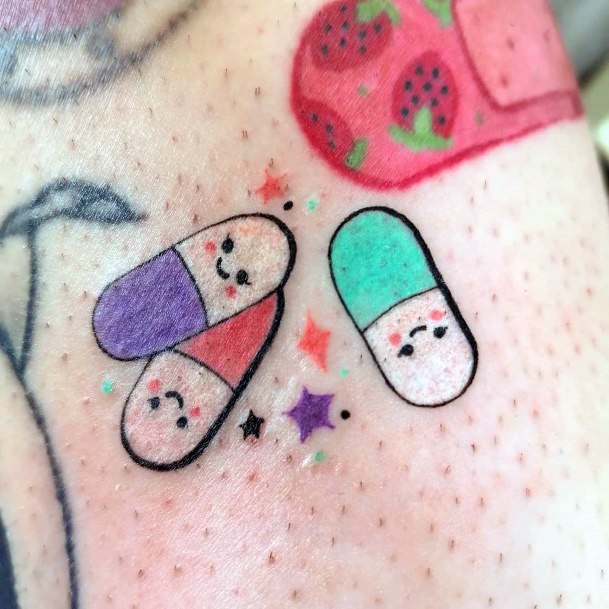 Artistic Pill Tattoo On Woman