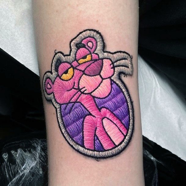 Artistic Pink Panther Tattoo On Woman