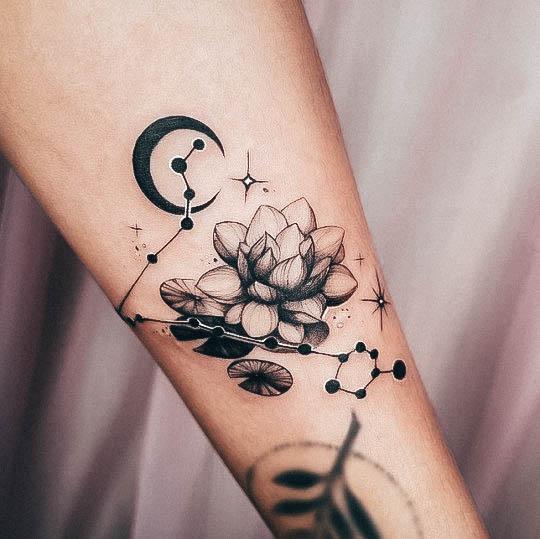 Artistic Pisces Tattoo On Woman Flower Forearm