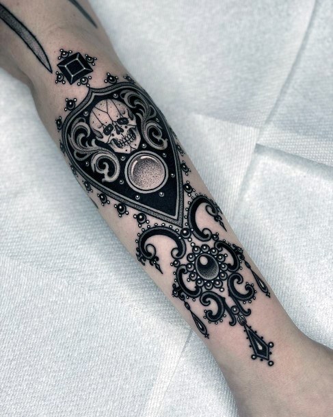 Artistic Planchette Tattoo On Woman