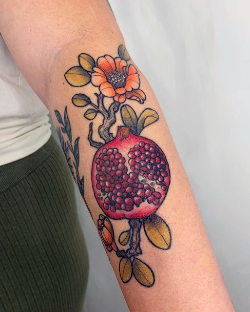 Artistic Pomegranate Tattoo On Woman