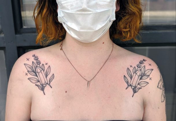 Artistic Quartz Tattoo On Woman