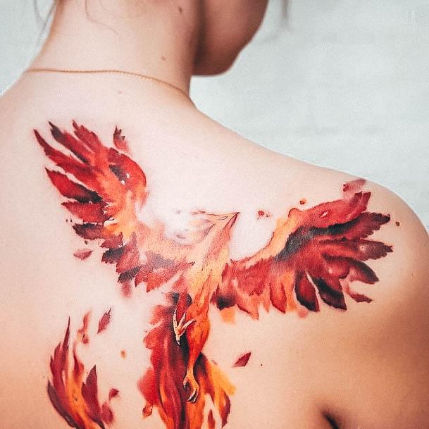 Artistic Red Ink Tattoo On Woman