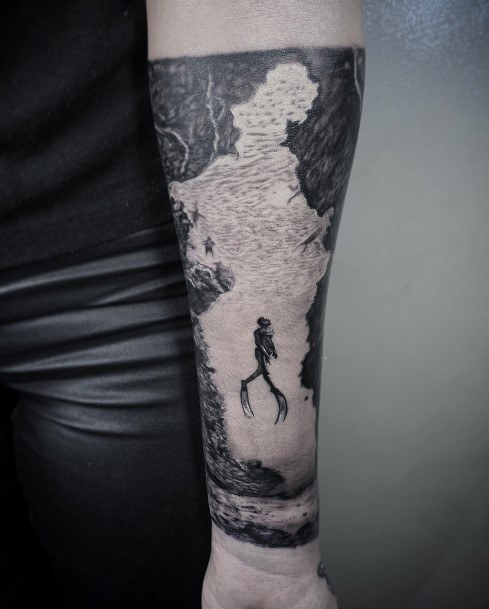 Artistic Scuba Diving Tattoo On Woman