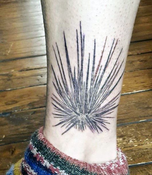 Artistic Sea Urchin Tattoo On Woman