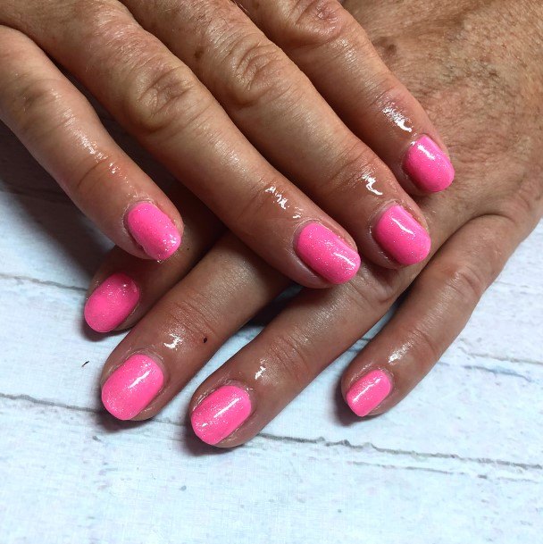 Artistic Short Pink Nail On Woman