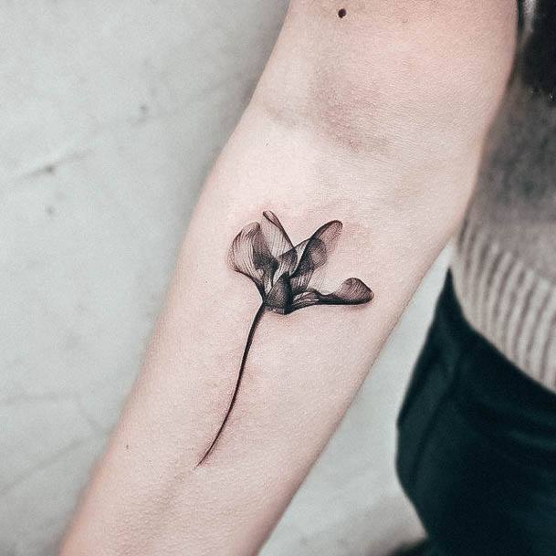 Artistic Simple Flower Tattoo On Woman