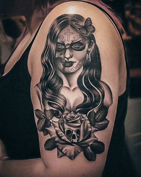 Artistic Skull And Rose Tattoo On Woman