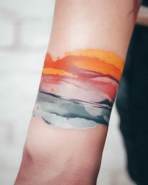 Artistic Small Arm Tattoo On Woman